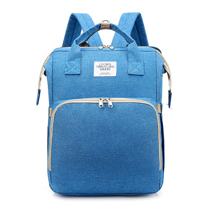 Versatile Mom: Stylish and Functional Mother and Baby Portable Backpack Handbag.