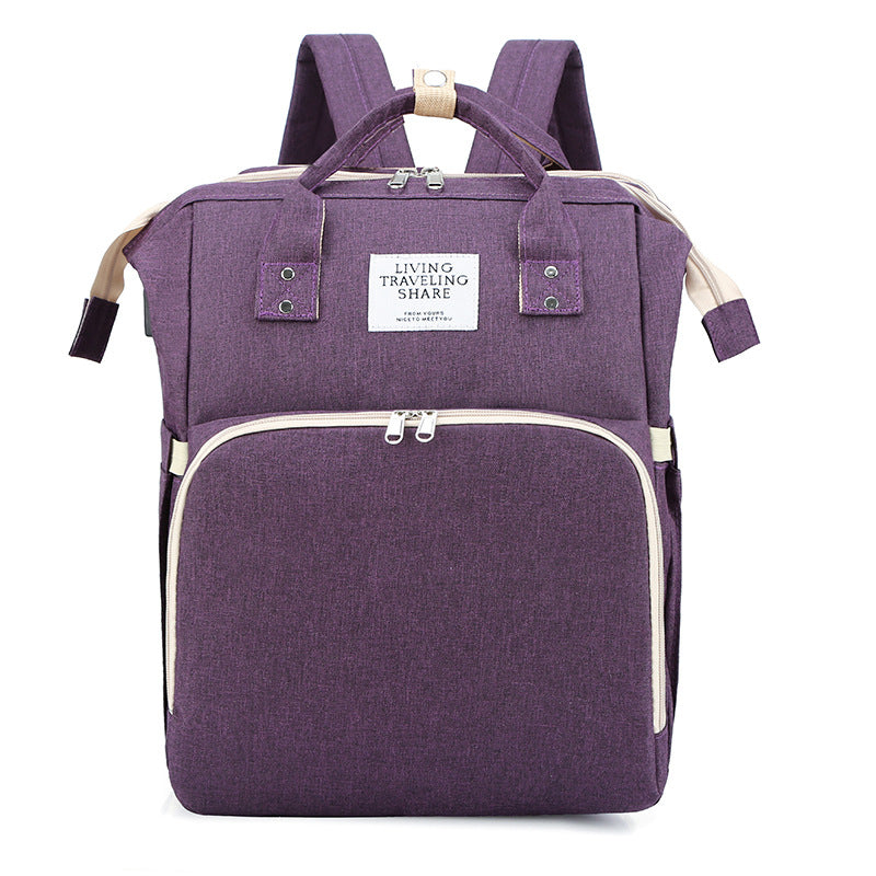 Versatile Mom: Stylish and Functional Mother and Baby Portable Backpack Handbag.