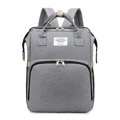 Versatile Mom: Stylish and Functional Mother and Baby Portable Backpack Handbag.