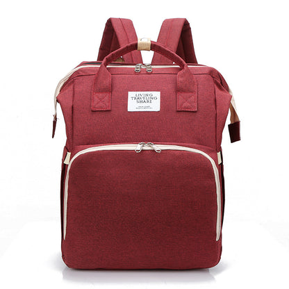 Versatile Mom: Stylish and Functional Mother and Baby Portable Backpack Handbag.